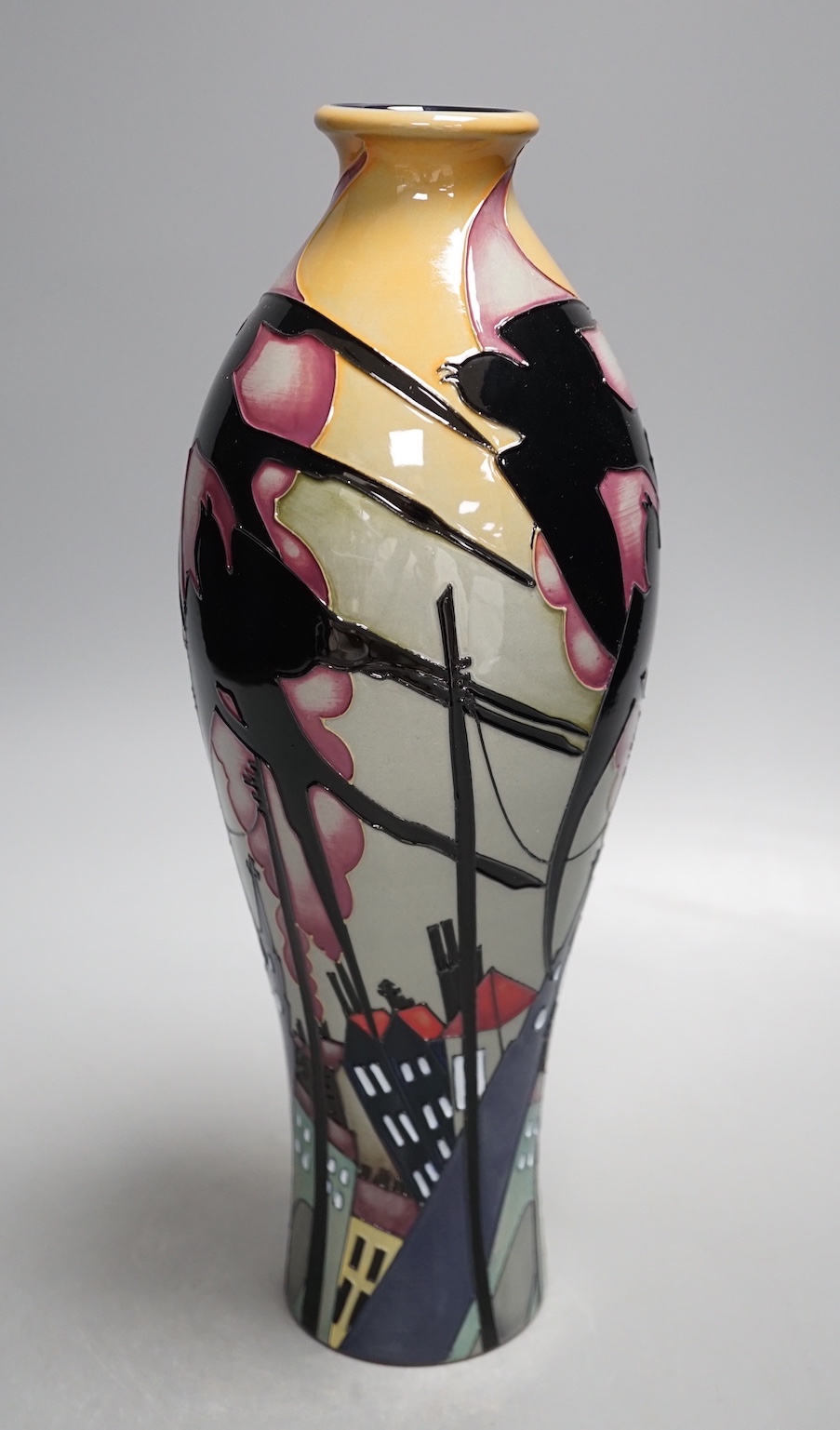 A rare Moorcroft 'swallows in smoke' vase by Kerry Goodwin, 2012, 31cms high.